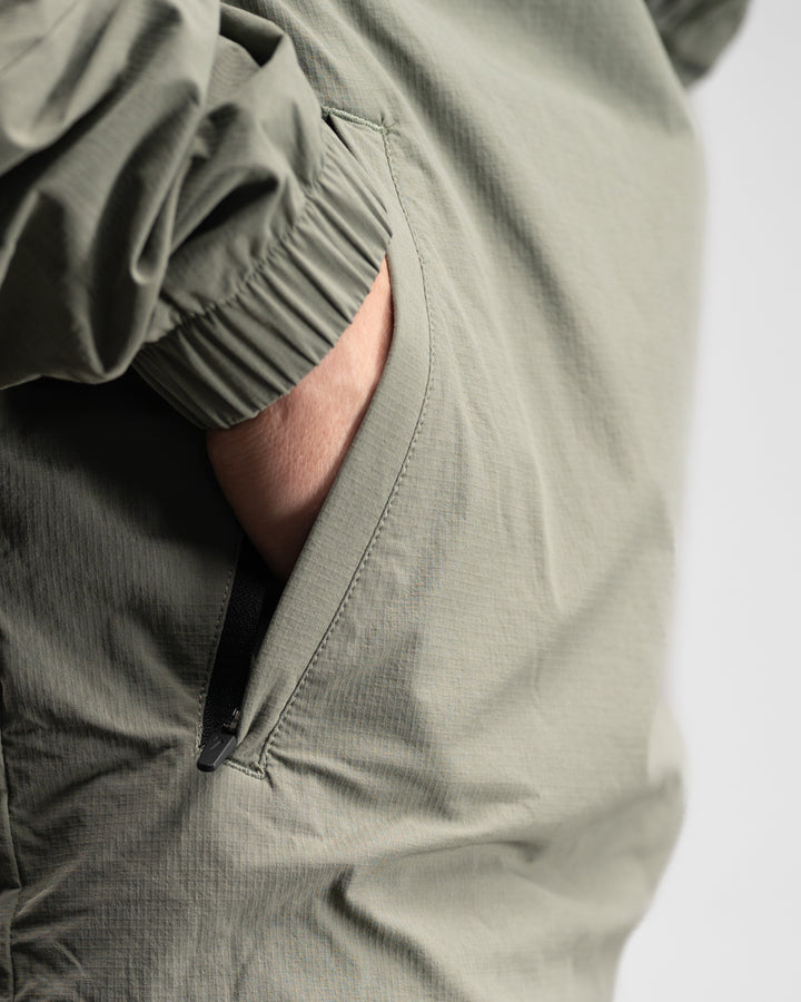 Elite Windbreaker Half Zip (Light Olive)